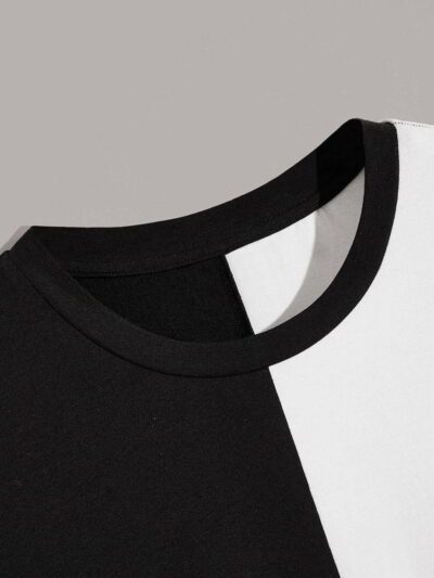 Close-up of bulk t-shirts. Soft cotton texture, neat stitching. Round neck, vibrant colors hints, ready for print. - View 2 o