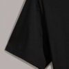 Close-up of bulk t-shirts. Soft cotton texture, neat stitching. Round neck, vibrant colors hints, ready for print. - View 4 o