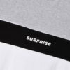 Stack of folded t-shirts, smooth cotton blend, close-stitched seams. Essential crew neck tees in solid colors, ready for reta