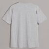Stack of folded t-shirts, smooth cotton blend, close-stitched seams. Essential crew neck tees in solid colors, ready for reta