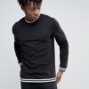 Bulk team t-shirts in action! See breathable, durable jerseys, perfect for sports. Note reinforced stitching and soft feel. -