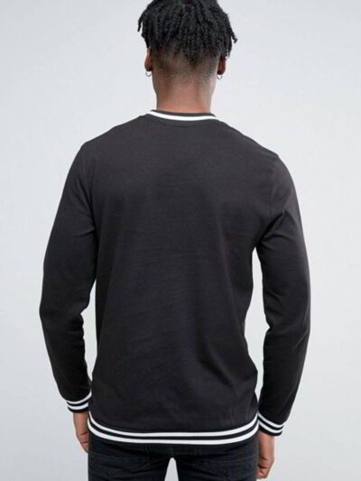 Bulk team t-shirts in action! See breathable, durable jerseys, perfect for sports. Note reinforced stitching and soft feel. -