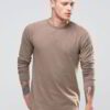 Close-up on a stack of vibrant, custom-printed tees. Notice the tight knit of the durable cotton and reinforced shoulder stit