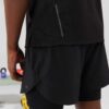 Urban men's set: tee & shorts. Soft-looking, breathable fabric, possibly cotton. Dark color scheme with subtle design details