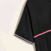 Close-up of a v-neck tee shirt, soft-looking knit fabric, clean stitching detail. Casual garment, available in multiple color
