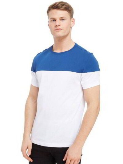 Crisp white t-shirts, neatly stacked. Soft cotton knit with clean seams visible. Ready for custom printing, bright and pristi