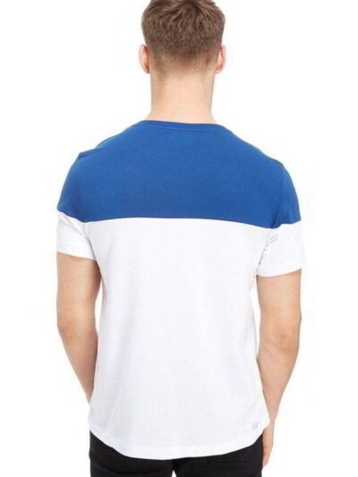 Crisp white t-shirts, neatly stacked. Soft cotton knit with clean seams visible. Ready for custom printing, bright and pristi