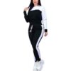 Pile of ladies' tracksuits in various colors. Soft, fleecy texture visible. Close stitching details shown on cuffs & seams. S