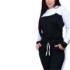 Pile of ladies' tracksuits in various colors. Soft, fleecy texture visible. Close stitching details shown on cuffs & seams. S