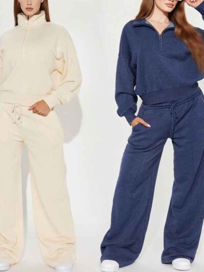 Women's track suit set: soft-looking, coral fleece. Ribbed cuffs, drawstrings. Custom design potential evident. Comfort & sty