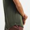 Pile of soft, printed women's tees. Smooth cotton knit, vibrant designs, neat double-needle stitching. Comfortable everyday w