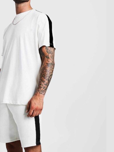 Affordable t-shirt and shorts set. Soft-look knit, likely cotton blend. Comfy casual wear in heathered grey. Clean, simple st