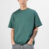 Oversized t-shirt, chest pocket detail. Soft jersey knit with visible dropshoulder seam. Hints of heather gray. Relaxed fit.