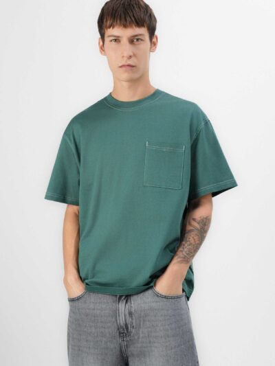 Oversized t-shirt, chest pocket detail. Soft jersey knit with visible dropshoulder seam. Hints of heather gray. Relaxed fit.