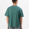Oversized t-shirt, chest pocket detail. Soft jersey knit with visible dropshoulder seam. Hints of heather gray. Relaxed fit.