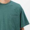 Oversized t-shirt, chest pocket detail. Soft jersey knit with visible dropshoulder seam. Hints of heather gray. Relaxed fit.
