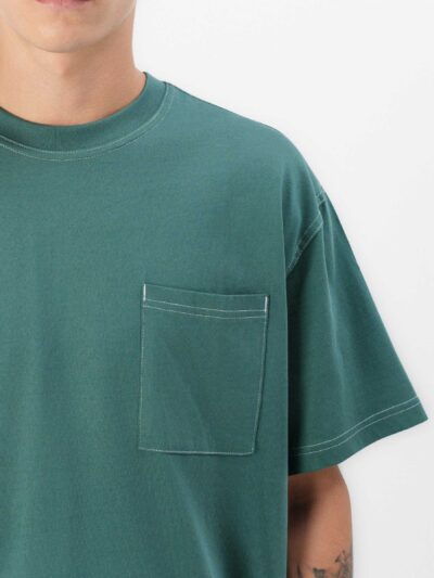 Oversized t-shirt, chest pocket detail. Soft jersey knit with visible dropshoulder seam. Hints of heather gray. Relaxed fit.