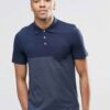 Color block polo shirt. Breathable, moisture wicking fabric with subtle texture. Clean stitching, short sleeves. Contrast col
