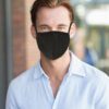 Cotton fabric face mask. Close-up reveals fine stitching, soft texture. Reusable mouth cover for adults. Available in multipl