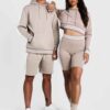 Cropped hoodie & high-waisted cycling shorts. Soft, loopback knit texture. White contrast stripes on ribbing. Activewear set.
