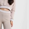 Cropped hoodie & high-waisted cycling shorts. Soft, loopback knit texture. White contrast stripes on ribbing. Activewear set.