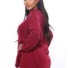 Black plus-size woman in a skinny fit tracksuit. Notice the smooth, matte fabric & strong, neat stitching. Figure-hugging sty