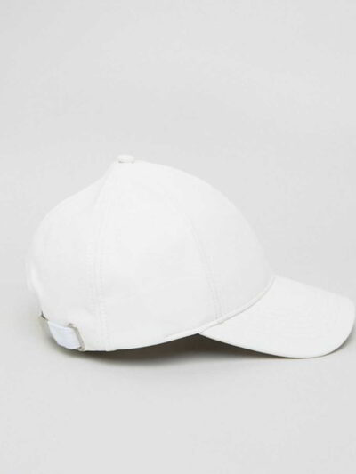 Structured twill cap with raised, bold 3D embroidery. Notice the depth of the stitching & slight sheen. Dark color & curved b