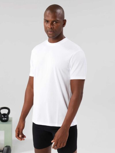 Heavy cotton men's t-shirt and shorts set. Relaxed drop shoulder fit, visible sturdy stitching, textured fabric. Solid color,