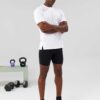 Heavy cotton men's t-shirt and shorts set. Relaxed drop shoulder fit, visible sturdy stitching, textured fabric. Solid color,
