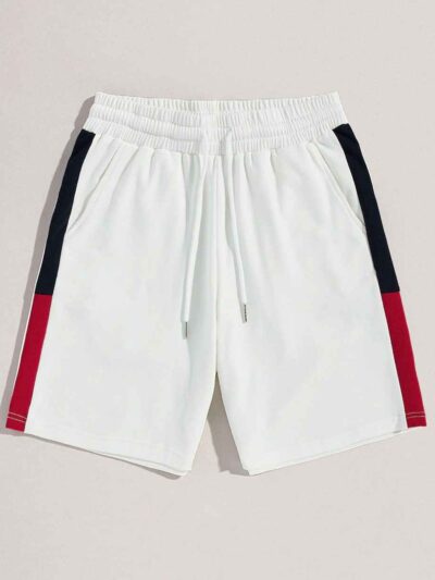 Textured cotton shorts, vibrant custom embroidery detail. Casual streetwear, available in varied colors. Note durable stitchi