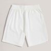 Textured cotton shorts, vibrant custom embroidery detail. Casual streetwear, available in varied colors. Note durable stitchi