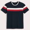 Close-up of a smooth cotton t-shirt, vivid graphic print. Double-stitched seams visible, soft, breathable fabric texture. Gar