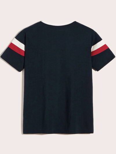 Close-up of a smooth cotton t-shirt, vivid graphic print. Double-stitched seams visible, soft, breathable fabric texture. Gar