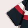 Close-up of a smooth cotton t-shirt, vivid graphic print. Double-stitched seams visible, soft, breathable fabric texture. Gar