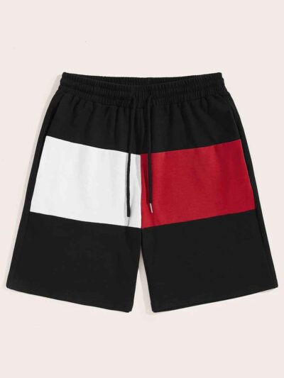 Close-up of heavyweight French Terry cotton gym shorts. Visible texture, clean stitching, relaxed fit. Hints of a light heath