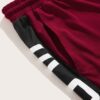 Close-up of custom athletic shorts. High-quality stitching, breathable fabric texture, vibrant color detail. Perfect for spor