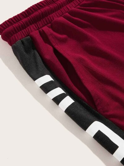 Close-up of custom athletic shorts. High-quality stitching, breathable fabric texture, vibrant color detail. Perfect for spor