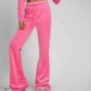 Heather gray women's jogger and hoodie set. Soft, looped knit with subtle embroidery detail. Casual athletic wear. Comfortabl