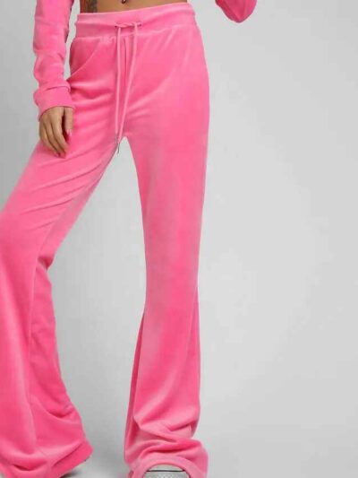 Heather gray women's jogger and hoodie set. Soft, looped knit with subtle embroidery detail. Casual athletic wear. Comfortabl