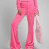 Heather gray women's jogger and hoodie set. Soft, looped knit with subtle embroidery detail. Casual athletic wear. Comfortabl