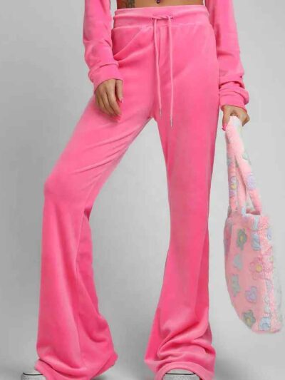 Heather gray women's jogger and hoodie set. Soft, looped knit with subtle embroidery detail. Casual athletic wear. Comfortabl