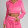 Heather gray women's jogger and hoodie set. Soft, looped knit with subtle embroidery detail. Casual athletic wear. Comfortabl