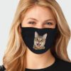 Close-up of a custom face mask. Soft fabric, clean stitching. Personalized logo detail. Protective, reusable mouth cover. - V