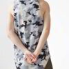 Men's tank top close-up. Soft knit fabric texture visible. Clean stitching, athletic cut. Hint of heather grey. Perfect for s