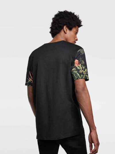 Lightweight tee with vibrant tropical print pocket. Soft cotton, neat stitching. Casual short-sleeve shirt, summery vibe. - V
