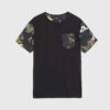 Lightweight tee with vibrant tropical print pocket. Soft cotton, neat stitching. Casual short-sleeve shirt, summery vibe. - V