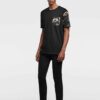 Lightweight tee with vibrant tropical print pocket. Soft cotton, neat stitching. Casual short-sleeve shirt, summery vibe. - V