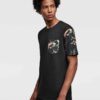 Lightweight tee with vibrant tropical print pocket. Soft cotton, neat stitching. Casual short-sleeve shirt, summery vibe. - V
