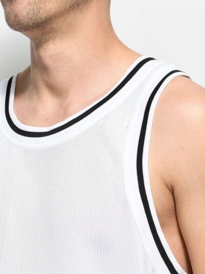 Close-up of a sleek, light grey performance tank top. Notice the fine, breathable knit fabric & reinforced stitching. Perfect