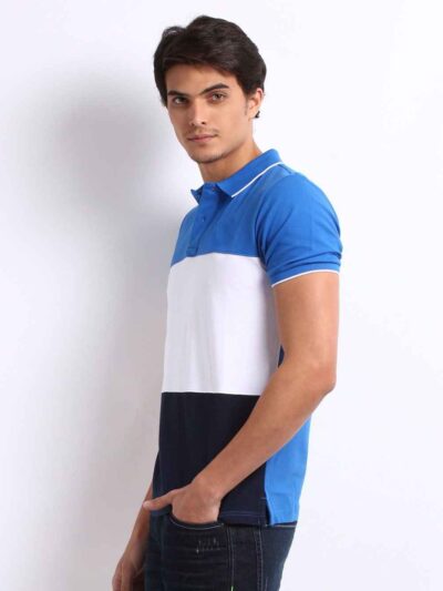 Close-up: Textured navy polo shirt, pique knit, clean stitching. Customization-ready. Breathable, durable fabric. Bulk polo s